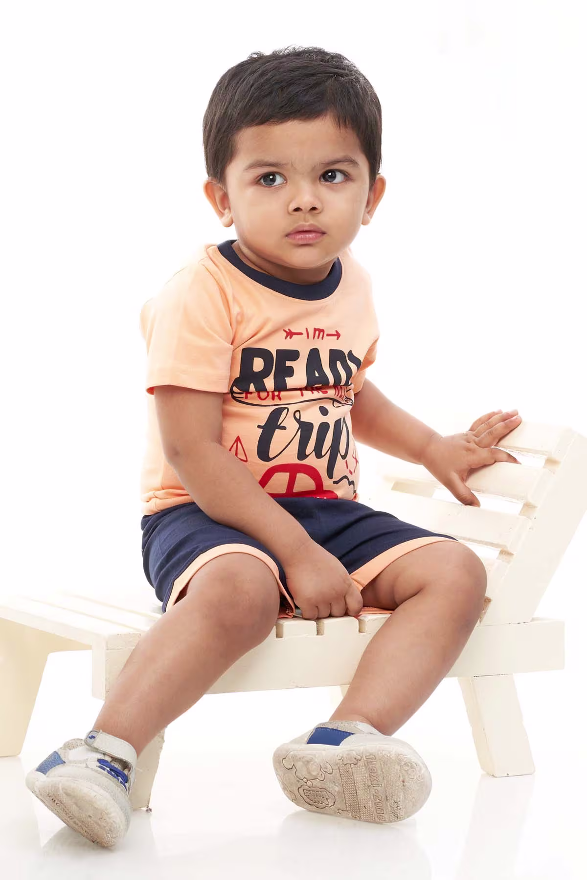 Stylish boy in cream ethnic set – festive kidswear by Adzo Studio