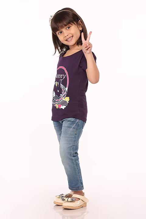 Studio portrait of a girl in Selvas traditional wear by Adzo Studio